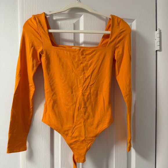 Orange Babaton long sleeve square neck bodysuit #bodysuit - Picture 1 of 4